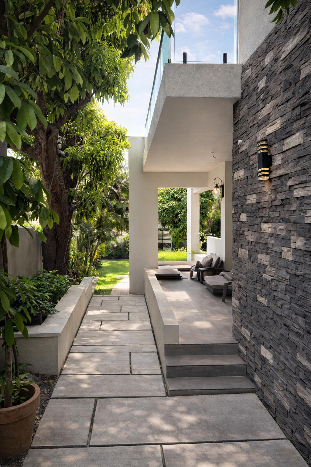 Garden passage accent wall featuring ConCreate Rustic Stone Veneer