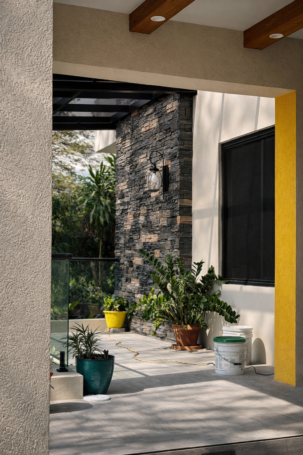 Terrace accent wall featuring ConCreate Rustic Stone Veneer